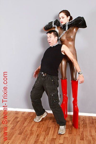 Various Pics Of Sweet Trixie Wearing Latex And Boots 8