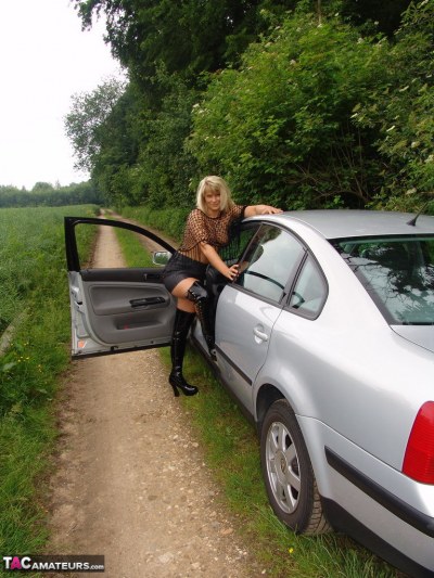 Amateur Blonde In Boots Spreads Her Legs 5