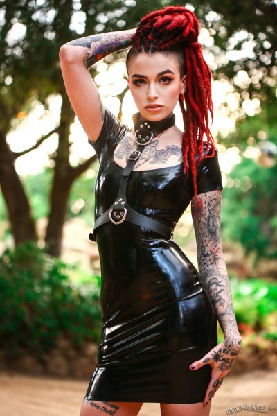 Inked Fetish Babe Strips Out Of Her Rubber Dress 2