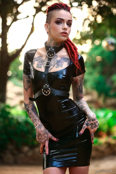 Inked Fetish Babe Strips Out Of Her Rubber Dress 5