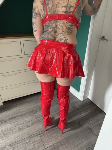 Inked Milf In Red Hot Pvc Boots And Baby Oil 2