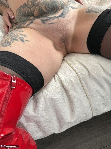 Inked Milf In Sexy Basque And Red Thigh High Boots 11