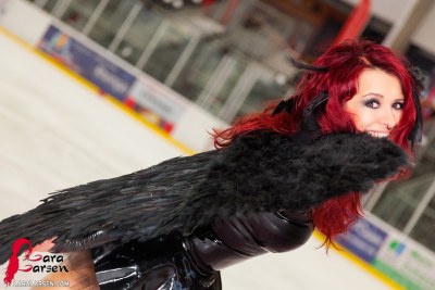 Lara Larsen In Black Swan On Ice 1