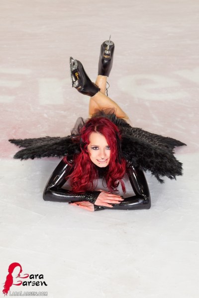 Lara Larsen In Black Swan On Ice 10