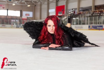 Lara Larsen In Black Swan On Ice 9