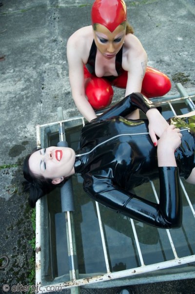 Outdoor Lesbian Domination In Rubber 4