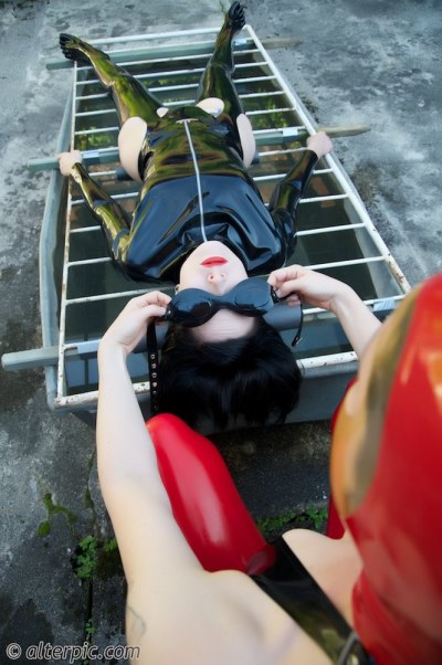 Outdoor Lesbian Domination In Rubber 6