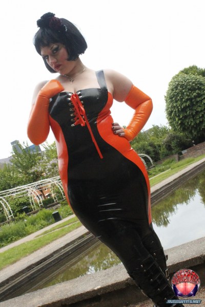 Public Posing In Orange Black Latex Outfit 1