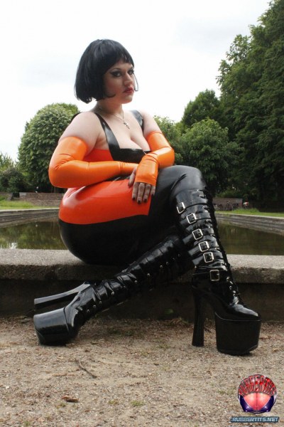 Public Posing In Orange Black Latex Outfit 3