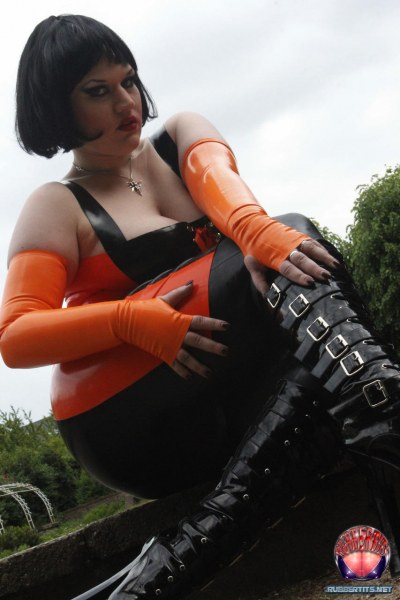 Public Posing In Orange Black Latex Outfit 4