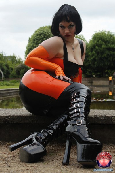 Public Posing In Orange Black Latex Outfit 8