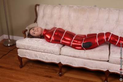 Redhead Bondege Girl In Shiny Catsuit 4