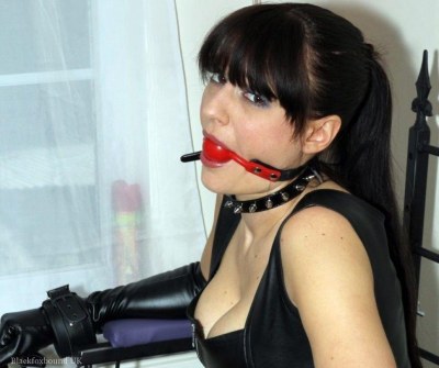 Tied And Gagged Slavegirl In Leather And Boots 16