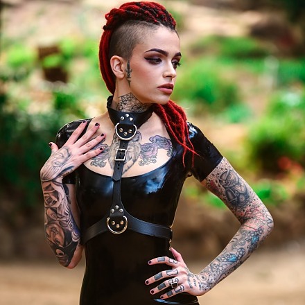 Sexy Tattooed Fetish Hottie In A Shiny Black Latex Dress