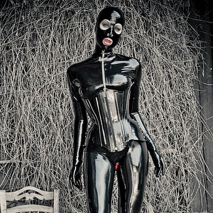 Fetish Babe Anna Rose In A Black Latex Catsuit And Corset