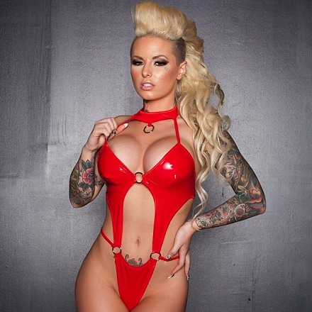 Tattooed Blonde Beauty Christy Mack In Red Pvc Suit And High Heels
