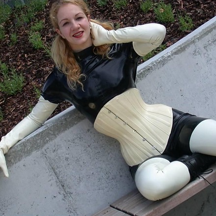 Amateur Fetish Girl Poses Outside In Black And White Latex Outfit