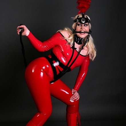 Blonde Fetish Girl Lady Avengelique In A Red Latex Ponygirl Outfit