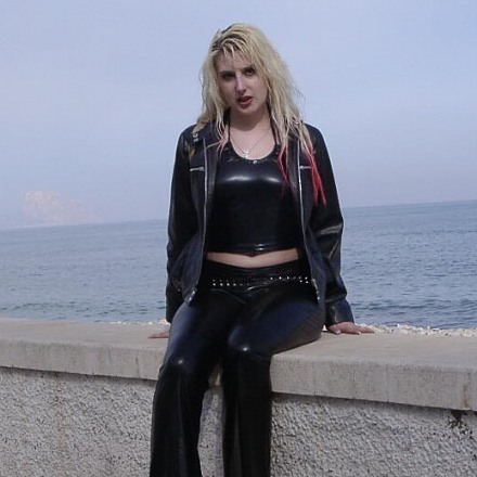 Blonde Amateur Lady Avengelique Poses Outdoors In A Black Leather Outfit