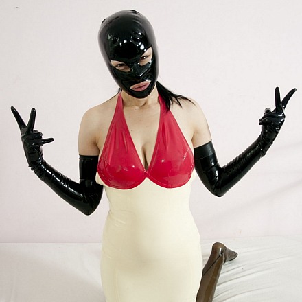 Fetish Girl Wanilianna On Bed In A Red And White Latex Dress With Rubber Hood And Gloves